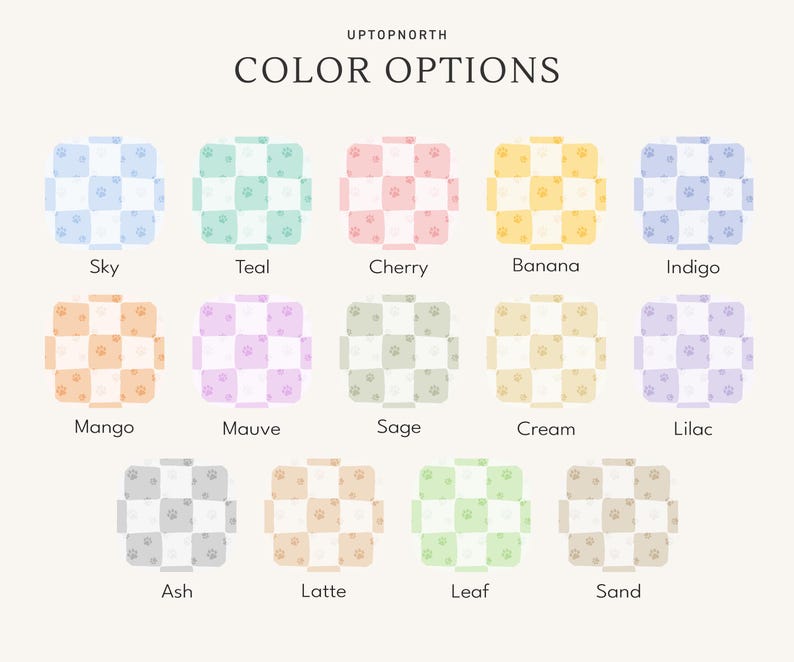 May include: A color chart titled UPTOPNORTH COLOR OPTIONS displaying fourteen square swatches in a checkerboard pattern. Each swatch features a two-tone grid with small paw print icons. Colors include Sky, Teal, Cherry, Banana, Indigo, Mango, Mauve, Sage, Cream, Lilac, Ash, Latte, Leaf, and Sand.