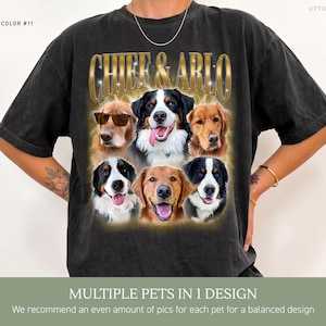 May include: A black short-sleeved t-shirt featuring a graphic print of six dogs, including golden retrievers and Bernese mountain dogs, with the text "CHIEF & ARLO" in a gold metallic font at the top. The design includes a glowing aura effect.