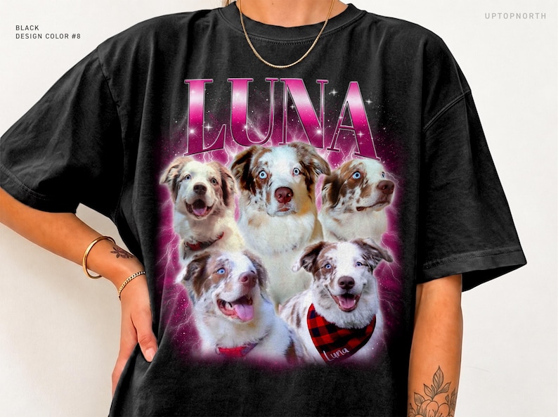 May include: A black t-shirt featuring a graphic print of five Australian Shepherd dogs. The word LUNA is printed in large pink letters above the dogs, set against a vibrant pink glowing background with small star accents.