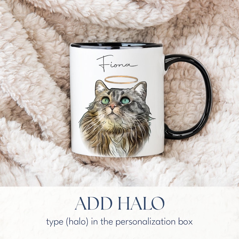 May include: White ceramic mug with a black handle and rim, featuring a watercolor illustration of a cat with a halo and the name "Fiona" in script. The text "ADD HALO" is below the mug.