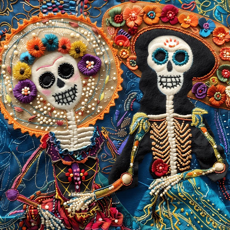 May include: Two embroidered sugar skull figures with colorful floral headbands and beaded embellishments. The figures are wearing traditional Mexican clothing and are set against a blue background.