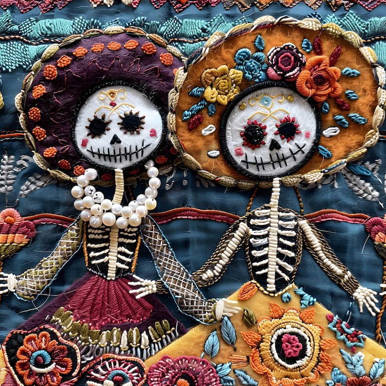May include: Two embroidered sugar skull figures with colorful floral headbands and beaded necklaces. The figures are on a blue background with floral embroidery.