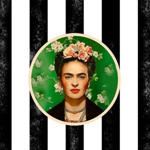 May include: A portrait of Frida Kahlo, centered on a black and white striped background. She wears a floral crown, earrings, and necklaces. The portrait is set against a green floral backdrop within a circular frame.