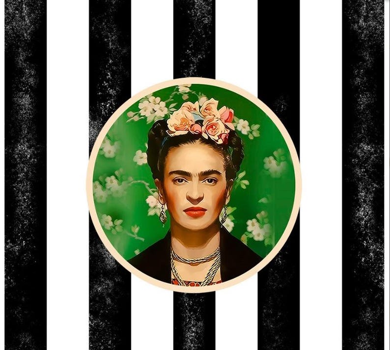 May include: A portrait of Frida Kahlo, centered on a black and white striped background. She wears a floral crown, earrings, and necklaces. The portrait is set against a green floral backdrop within a circular frame.