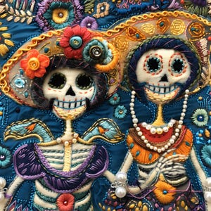 May include: Two embroidered skeletons wearing colorful hats and necklaces. The skeletons are smiling and have large eyes. The background is a dark blue fabric with floral embroidery.