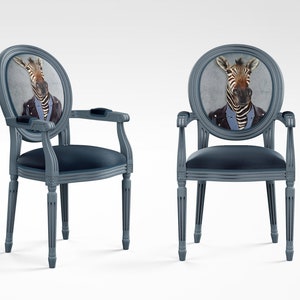 May include: Two gray oval-backed chairs with a zebra wearing a suit and tie printed on the back of each chair.