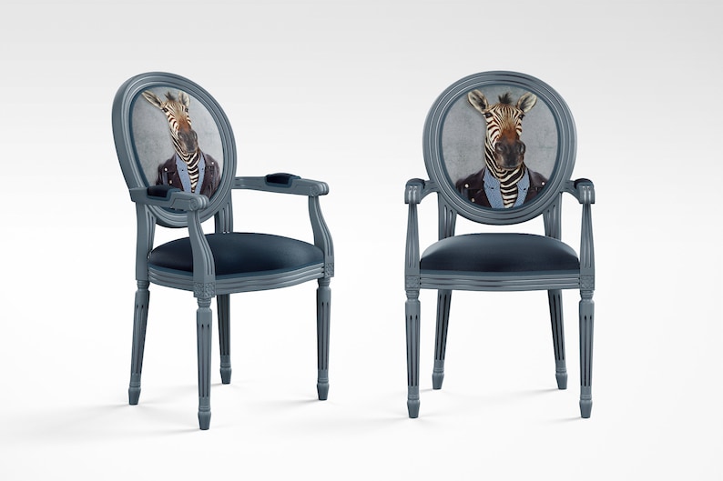 May include: Two gray oval-backed chairs with a zebra wearing a suit and tie printed on the back of each chair.