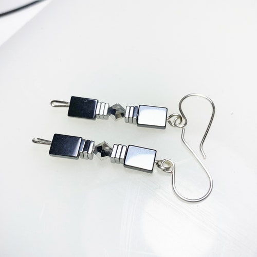 Preciosa Labrador shops Crystal and Reflective Hematite Drop Earrings. Shiny Hematite and Crystal Drop Earrings. Geometric Hematite Drop Earrings.