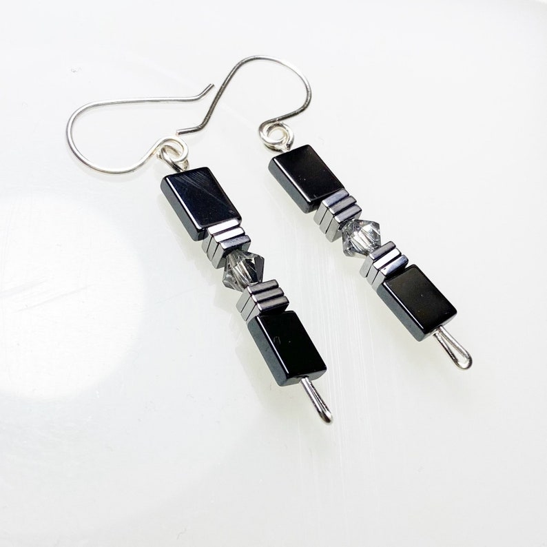 Preciosa Labrador shops Crystal and Reflective Hematite Drop Earrings. Shiny Hematite and Crystal Drop Earrings. Geometric Hematite Drop Earrings.