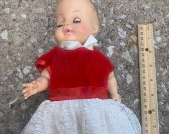 Vintage Baby Doll with moveable arms, legs and eyes