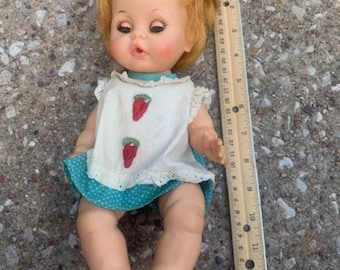 Vintage Baby Doll with moveable arms, legs and eyes