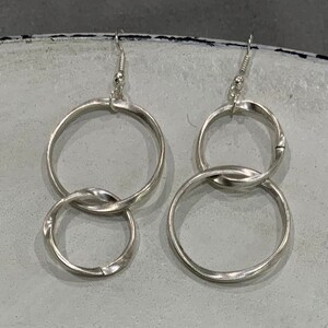 Matte Brushed Silver-Toned Inverted Double Hoop Earrings