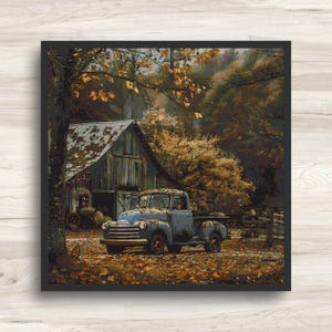 Könnte beinhalten: Ein Kreuzstich-Design zeigt einen alten blauen Pickup vor einer verwitterten Scheune. Die Szene spielt im Herbst, mit Herbstlaub und Bäumen in Braun- und Goldtönen. Das Kunstwerk ist in Schwarz gerahmt.
