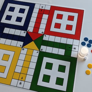 May include: A colorful game board with four squares, each a different color: blue, red, yellow, and green. Each square has a grid pattern and a set of four squares in the center. The board is made of cardboard and has a white background.