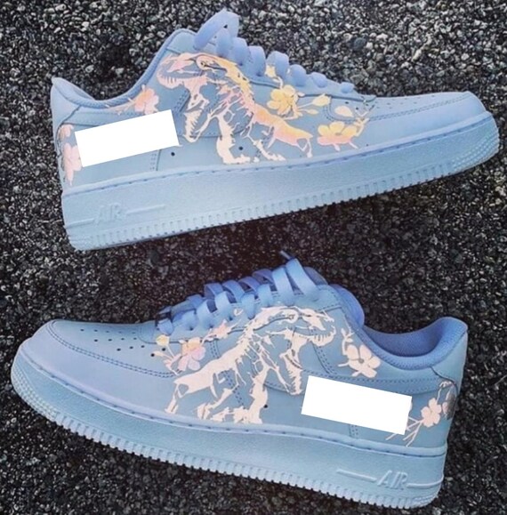 blue nikes with flowers