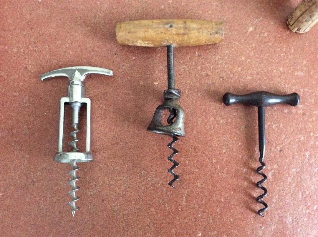 A Selection of Three Different Corkscrew Bottle Openers Etsy