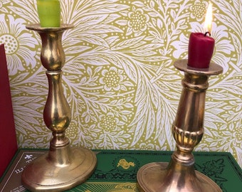 A Choice Of Two Antique Brass Candlestick  Holders