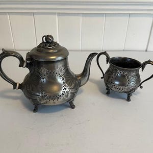 Antique Pewter Teapot With Fruit Embossed Lid  With Matching Sugar Bowl Made By W. H Ltd.