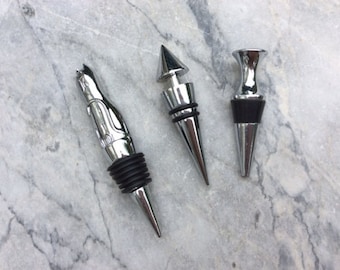 A Choice Of Three Vintage Wine Bottle Stoppers