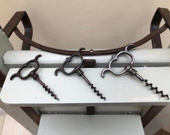 A Choice From Three Antique Four Finger Pull Corkscrew Bottle Openers