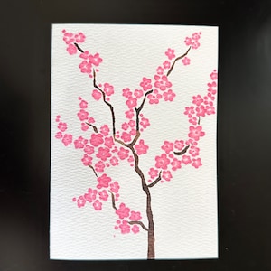 Tarjeta de flor de cerezo pintada a mano