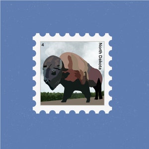 May include: A vintage postage stamp featuring a brown and black bison with the text "North Dakota" printed vertically on the right side of the stamp.