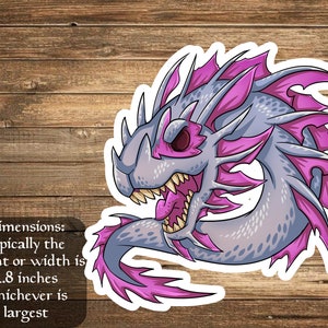 May include: A sticker of a purple and gray cartoon dragon with sharp teeth and pink spines. The dragon is facing right and has a menacing expression. The sticker is approximately 2.8 inches in size.