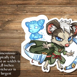 May include: A cartoon sticker of a gray and white mouse-like creature wearing a green and brown outfit and holding a blue scroll. The creature has blue eyes and a serious expression. A blue and white scroll is wrapped around the creature's body. A smaller blue cartoon figure is behind the creature.