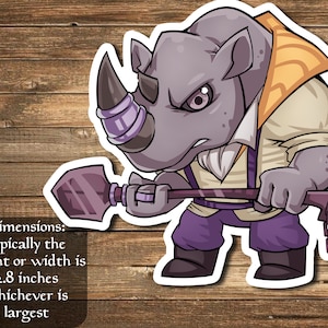 May include: A cartoon illustration of a purple and grey rhinoceros wearing a white shirt, purple trousers, and a yellow waistcoat. The rhino is holding a purple and grey shovel with a chain attached to the handle. The rhino is looking angry and has a determined expression on its face. The image is on a wooden background. Dimensions: typically the height or width is 2.8 inches whichever is largest.