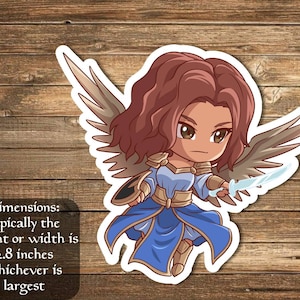 Puede incluir: Una pegatina con una ilustración de dibujos animados de un ángel femenino con cabello castaño, ojos azules y alas. Lleva un vestido azul y dorado y sostiene una espada. La pegatina mide aproximadamente 2,8 pulgadas.