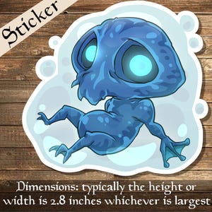 May include: A blue cartoon creature with glowing eyes, floating in a white circle. The creature has a large head and a small body with three fingers on each hand. The creature is a sticker.