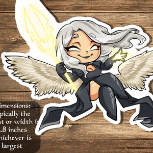 May include: A sticker featuring a cartoon angel with white hair, black clothing, and a golden trident. The angel has wings and is flying. The sticker is approximately 2.8 inches in size.