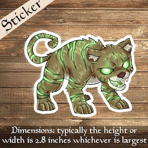 May include: Green and brown cartoon sticker of a snarling tiger with glowing green eyes. The sticker is approximately 2.8 inches wide or tall.
