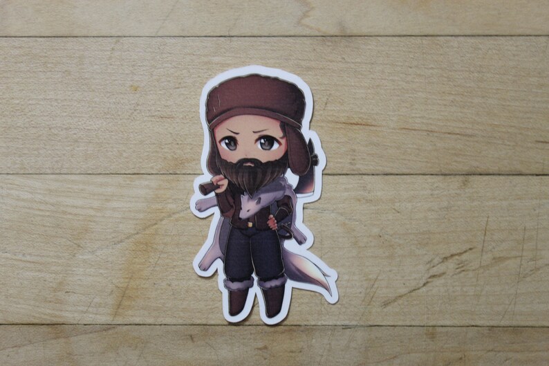 May include: A cartoon sticker of a person with a brown beard and a brown hat holding an axe. The person is wearing a brown jacket, blue pants, and brown boots. The sticker is on a wooden surface.