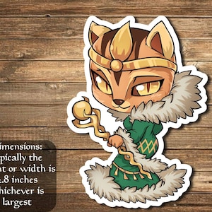 May include: A cartoon sticker of a cat wearing a gold crown and green robe, holding a golden staff. The cat has yellow eyes and brown fur. The sticker is approximately 2.8 inches in size.
