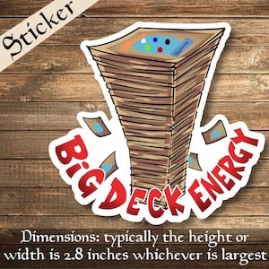 May include: A sticker with the words "Big Deck Energy" in red, with a stack of cards illustration. The sticker is approximately 2.8 inches in height or width. The top of the stack has colorful details.