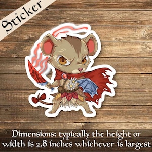 May include: A sticker featuring a cartoon mouse warrior with a red cape, holding a sword and a shield. The mouse has brown fur, a red nose, and angry yellow eyes. The sticker is approximately 2.8 inches wide.