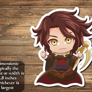 May include: A cartoon sticker of a young man with brown hair, wearing a brown and red robe, holding a gold staff with a crescent moon at the top. The sticker is on a wood background.