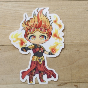 Puede incluir: Una pegatina de dibujos animados de un personaje femenino con cabello naranja fuego y un atuendo rojo y dorado. Ella sostiene llamas en cada mano y tiene una expresión decidida en su rostro.