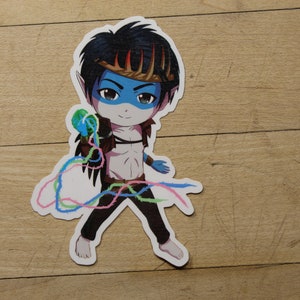 May include: A blue-skinned cartoon character with black hair and a crown, wearing a brown vest and black pants, holding a ball of colorful string.