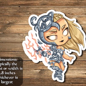 May include: A sticker featuring a cartoon woman with blonde hair, wearing a silver and gray outfit with lightning bolts. The sticker is on a wooden background.
