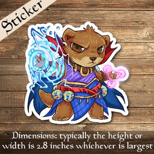 May include: A sticker featuring a cartoon illustration of a brown bear wearing a blue and purple robe, holding a blue glowing orb in one hand and a pink glowing orb in the other. The bear has a serious expression and is wearing a red sash around its waist.