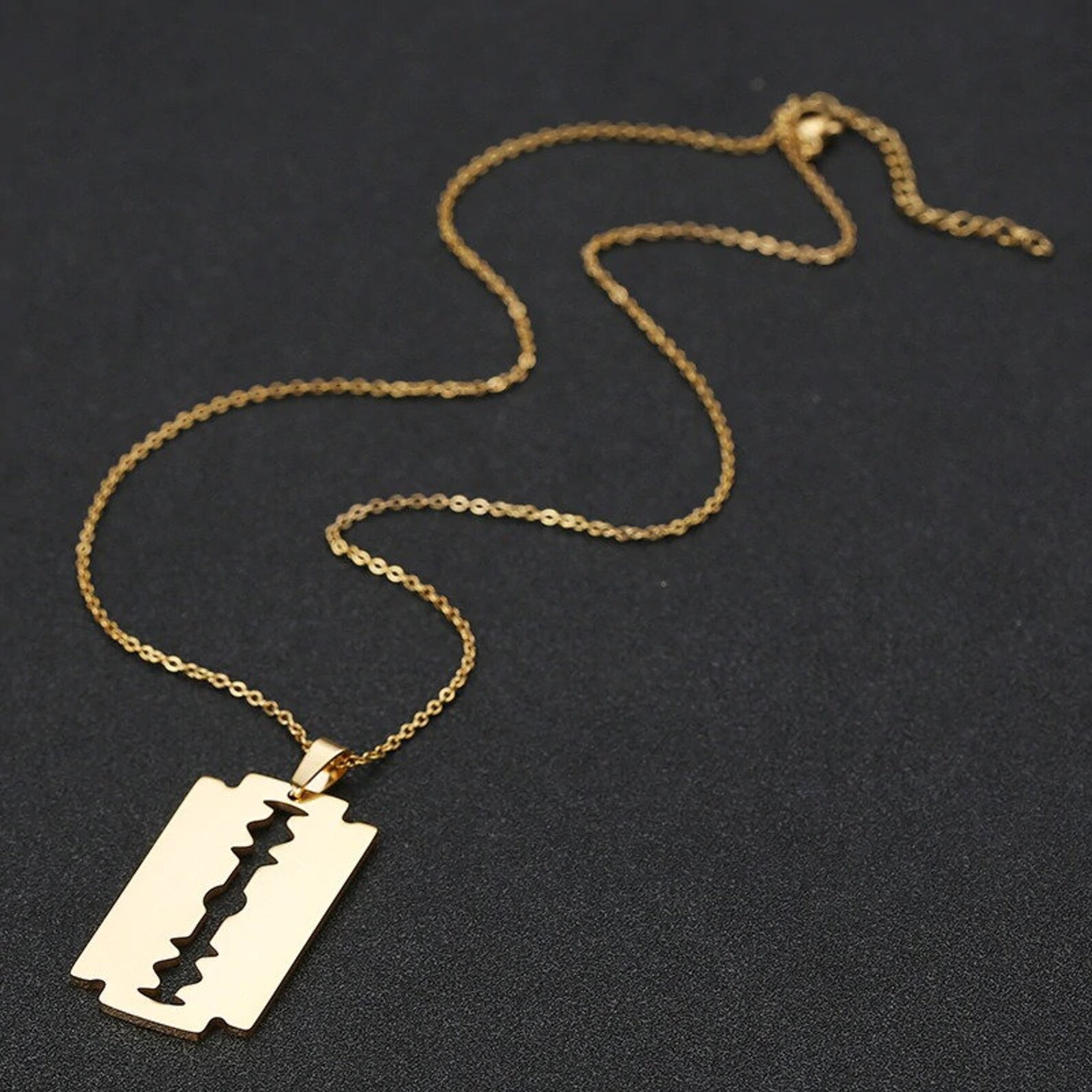 Silver razor blade pendant Clearance