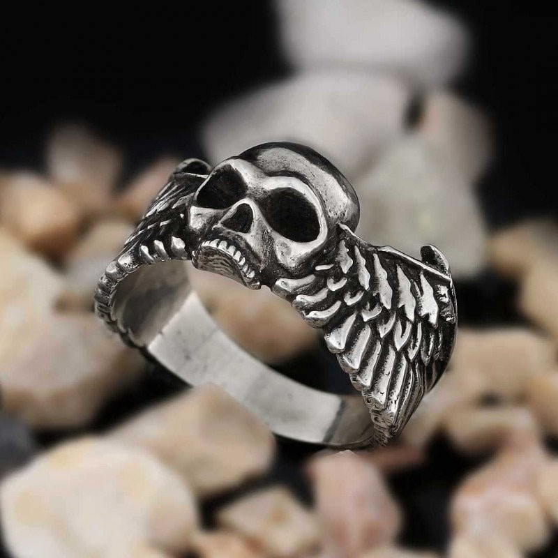 Skull ring with best sale wings