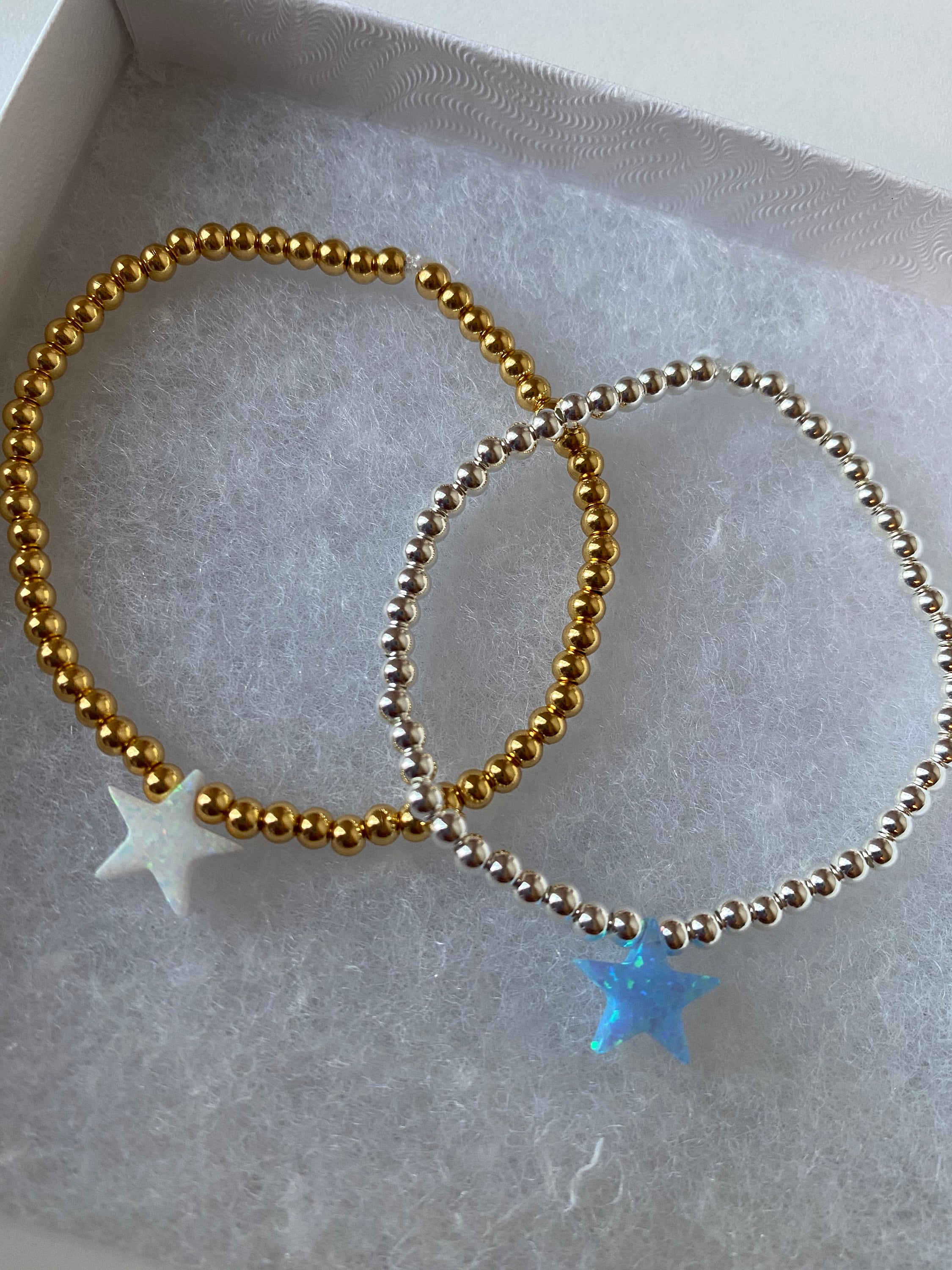 Gold Beaded bracelet with star charm