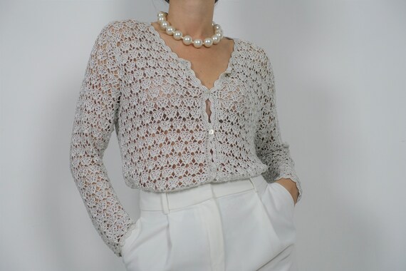 Crochet cardigan with silver yarn