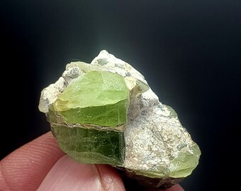 64 CRT Beautiful peridot Rough crystal combined lovely with self standing position from kpk Pakistan