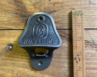 FOSTERS \\ Cast Iron Wall Mounted Bottle Opener \\ Bar \\ Hotel \\ Pub \\ Antique \\ Vintage \\ gift \\ Home Bar \\ Foster’s