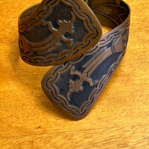 Native American all copper with hinge cuff bracelet /dancing Kachina/cloud with rain hallmark and real nice patina. See photos