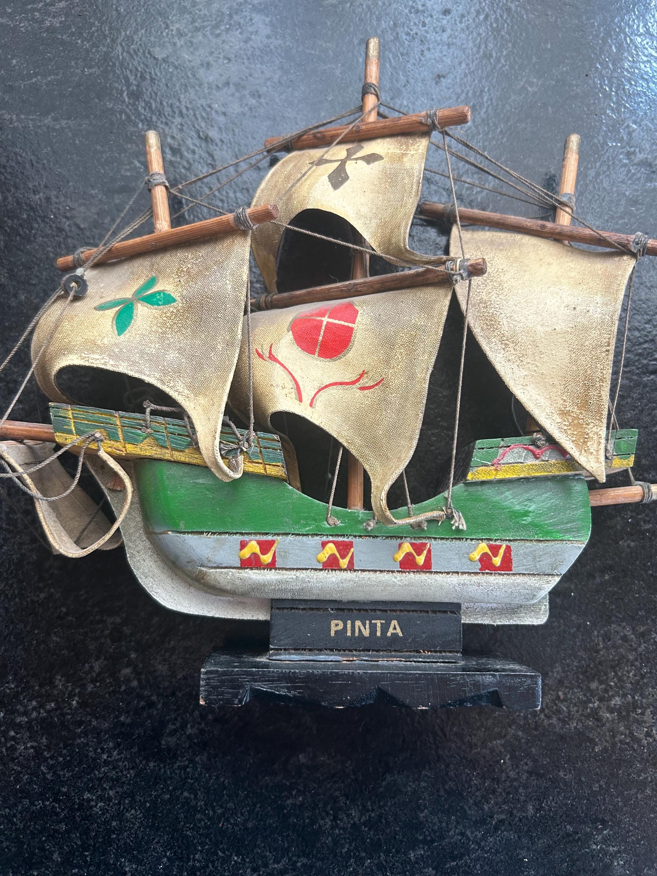 Vintage Pinta (from the Christopher Columbus group) ship model made of fabric sails and wooden body.
